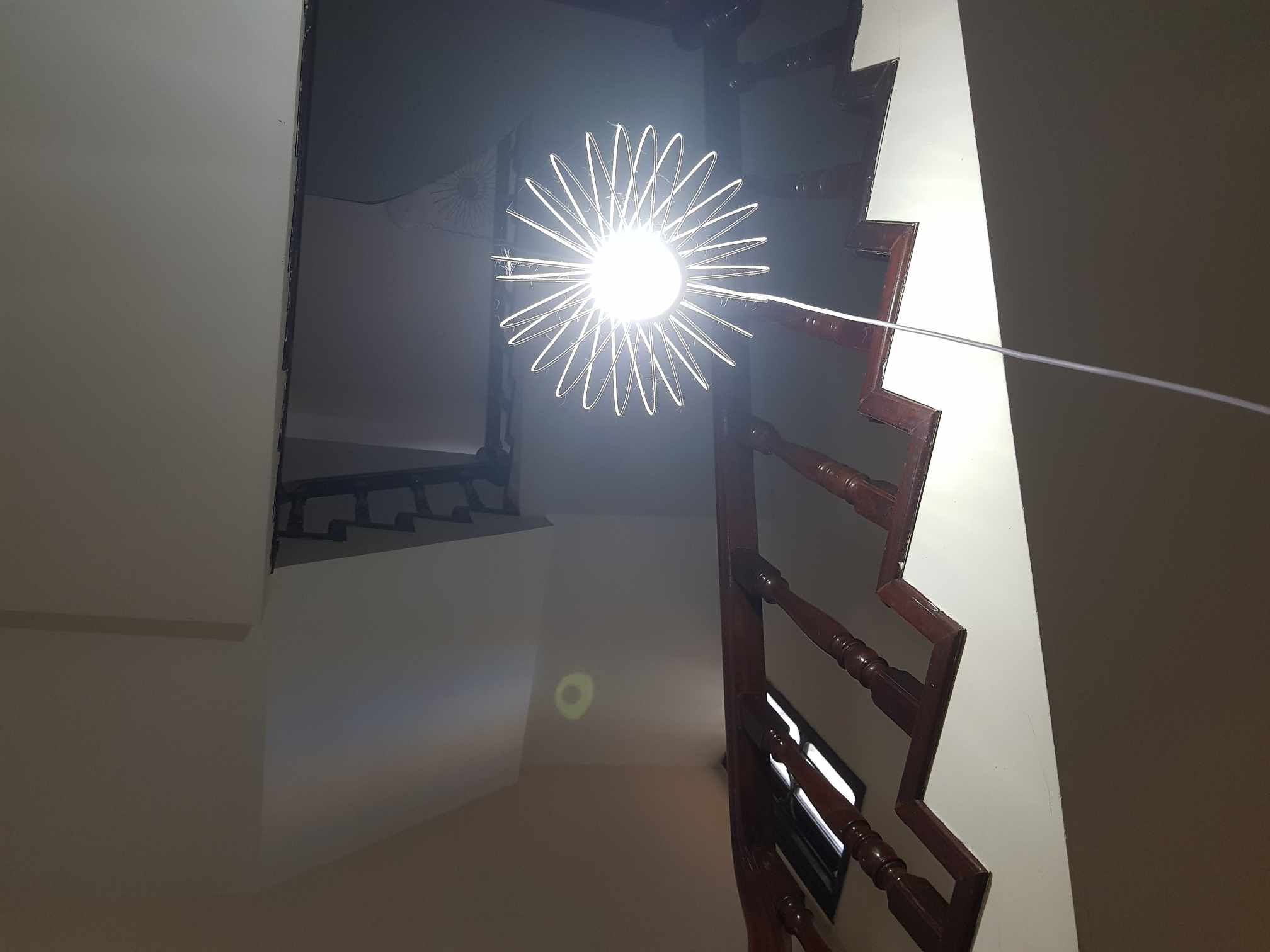 Motion sensing stairwell light installation